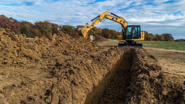 Pelle Caterpillar 311F LRR : puissance et polyvalence